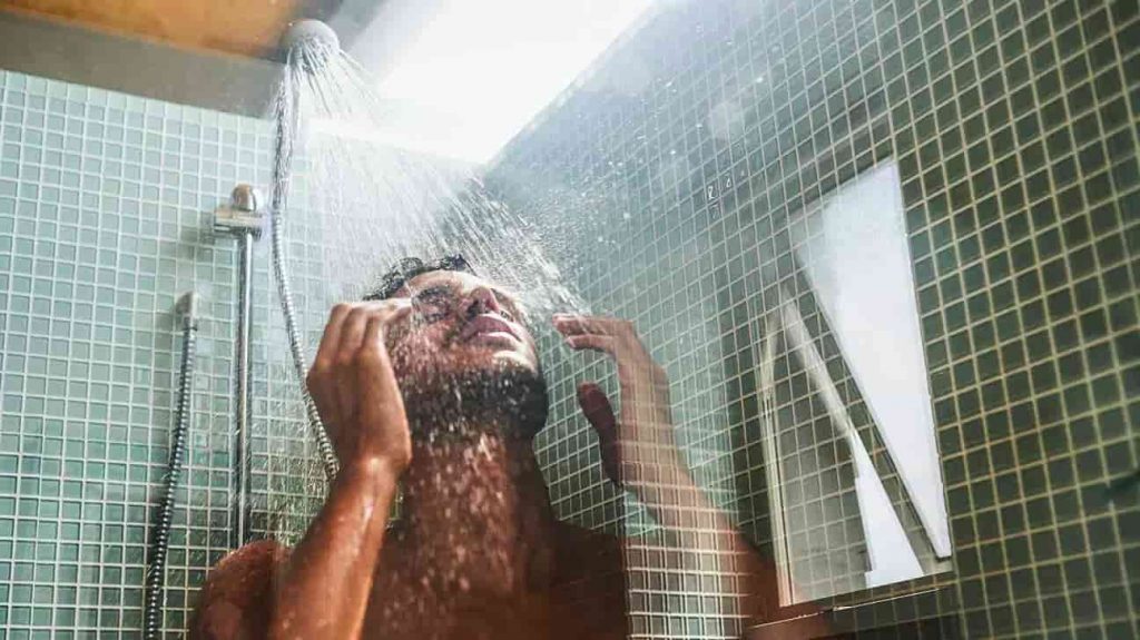 Taking a hot shower for cold